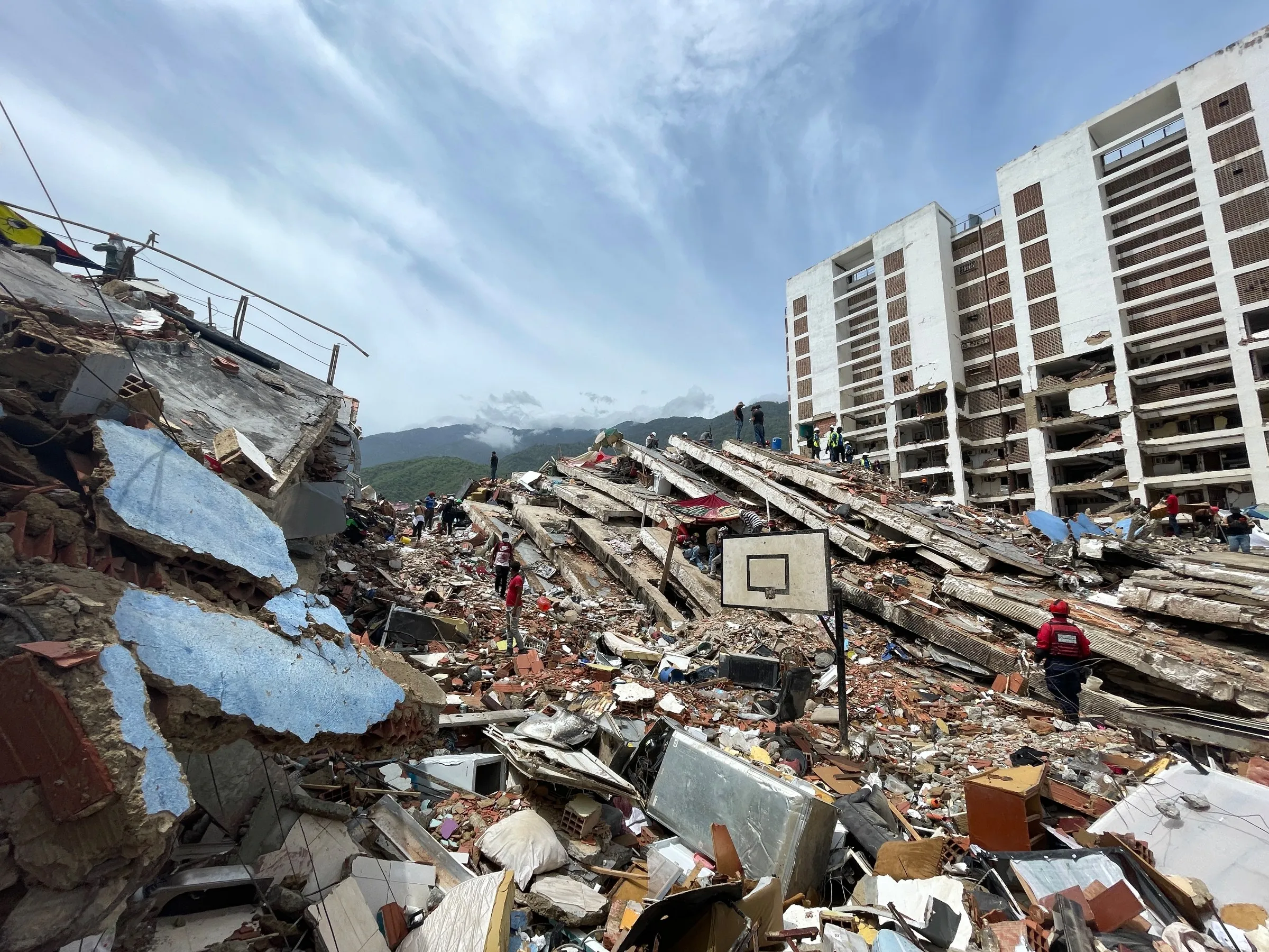 Destruction at Los Cocos housing complex after twin earthquakes in June