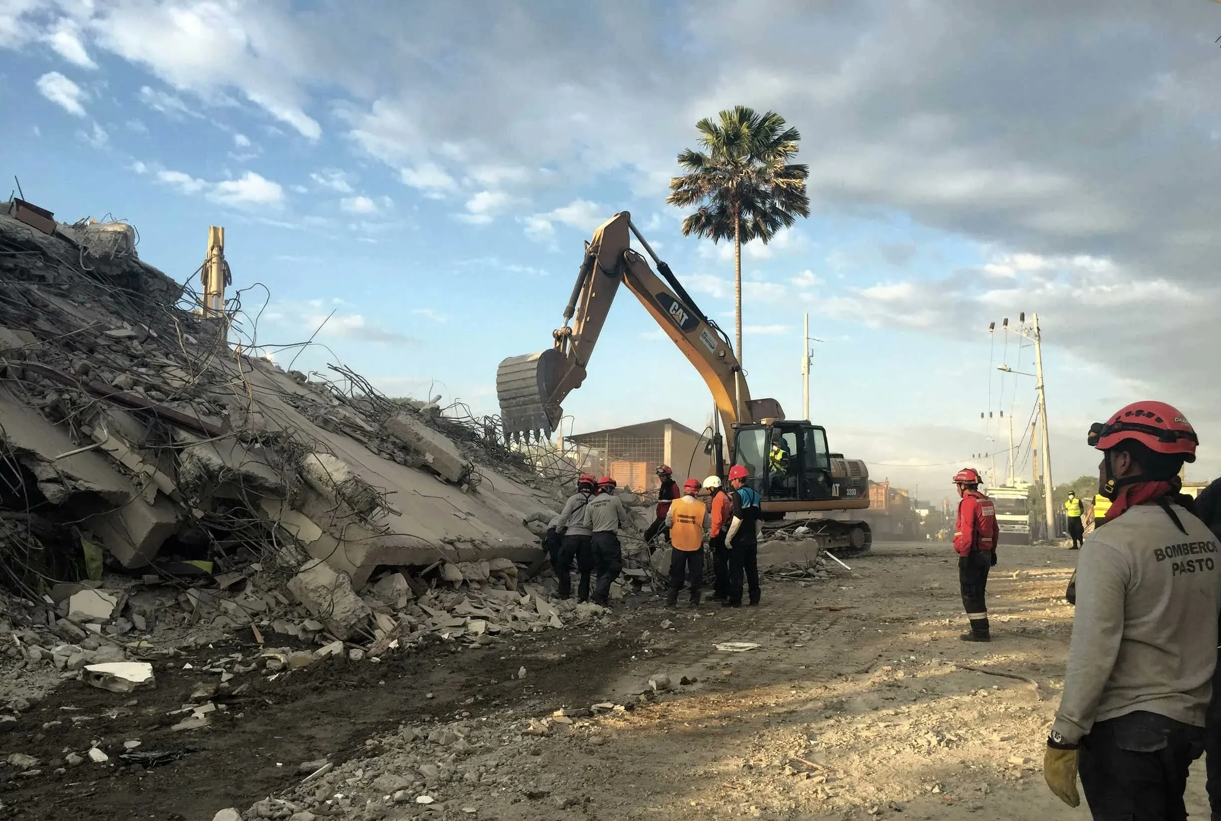 Rescuers in Pedernales, Ecuador spent days at the beachside Hotel Royal, removing at least five bodies.