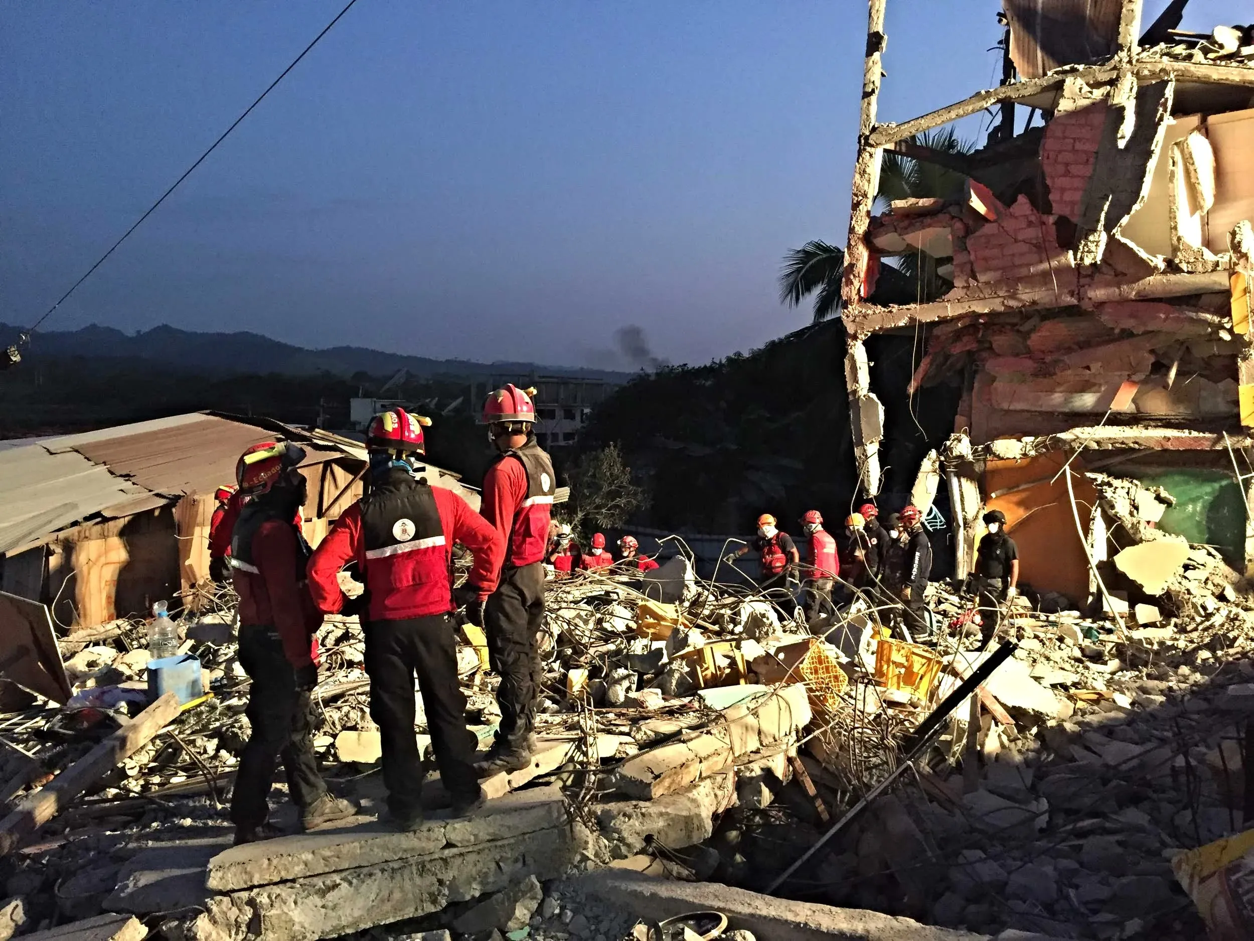 Rescuers at dusk, Pedernales, Ecuador, April 2016